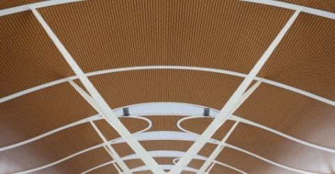 Close-up of a motorized restaurant pergola canopy, adjustable for sun or shade.