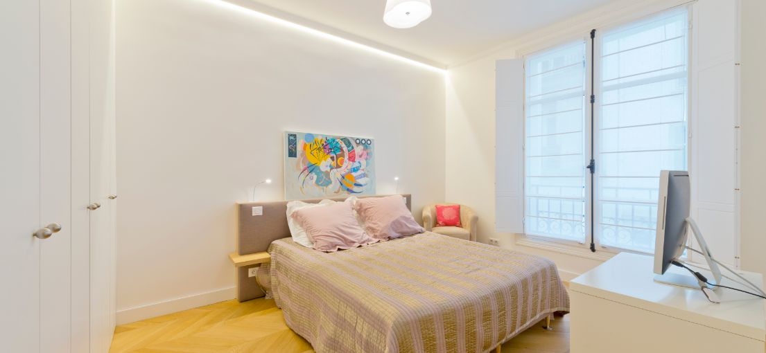 Cozy Bedroom Ambiance with Roman Shades