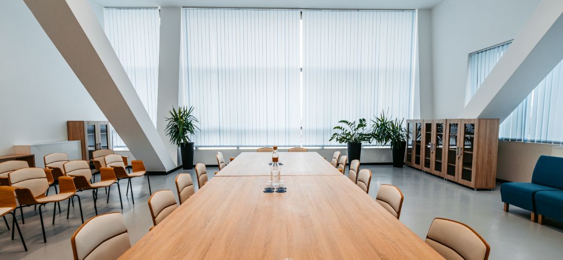 Elegant conference room with floor-to-ceiling vertical blinds in Malibu.