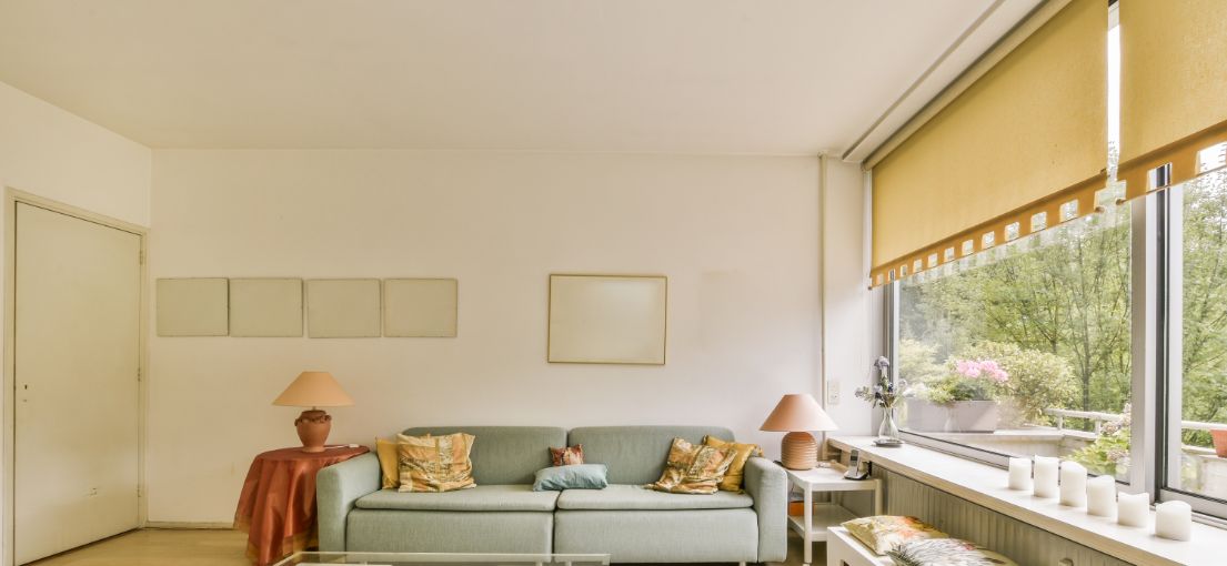 Interior of a Woodland Hills living room with stylish yellow roller shades.