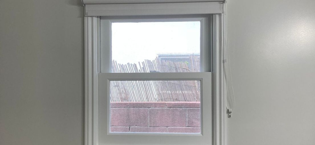 Sheer roller shades providing light control and privacy in an Agoura Hills bathroom.