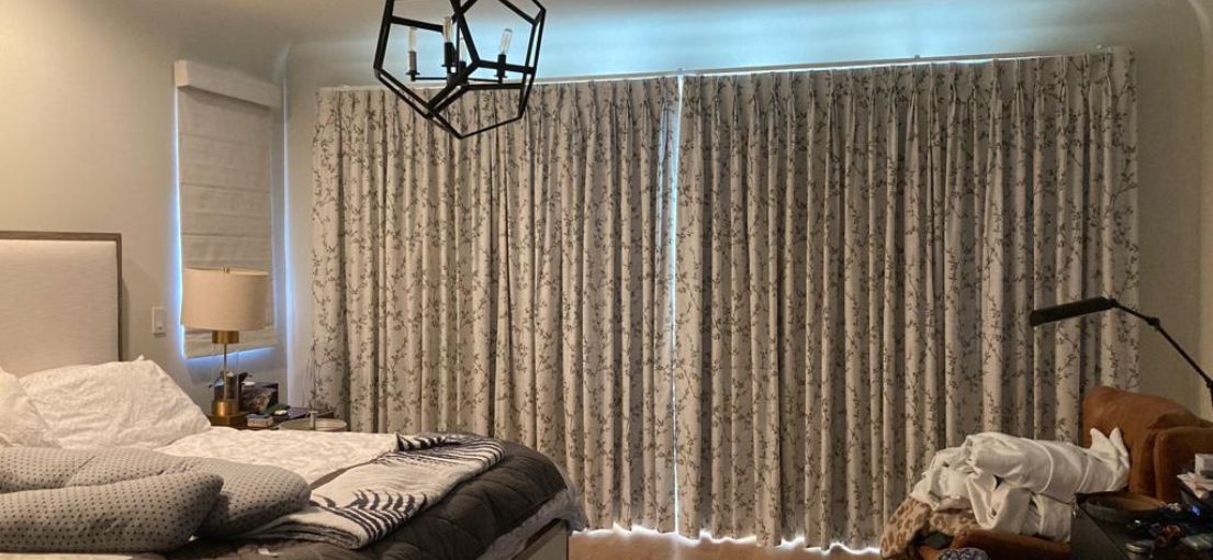 Master Blinds' custom window treatments including airy curtains, patterned drapes, and Roman shades in Venice residence.